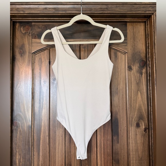 Rae Mode Beige Scoop Neck Bodysuit – Sleeveless Stretch Fit with Snap Closure - Picture 1 of 9